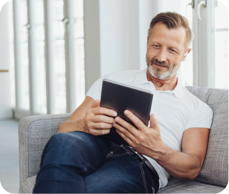 An owner reading alerts on a tablet